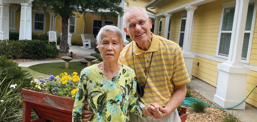 Dick and Yuka at Trinity Springs Memory Care, sharing time together outdoors