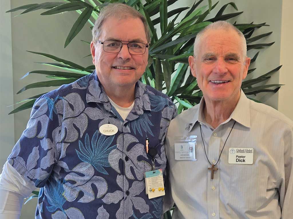 Pastor Chuck and Pastor Dick pose for a picture